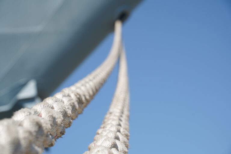Ship.,Ship,Docked,In,The,Port.,Detail.,The,Ropes,Of